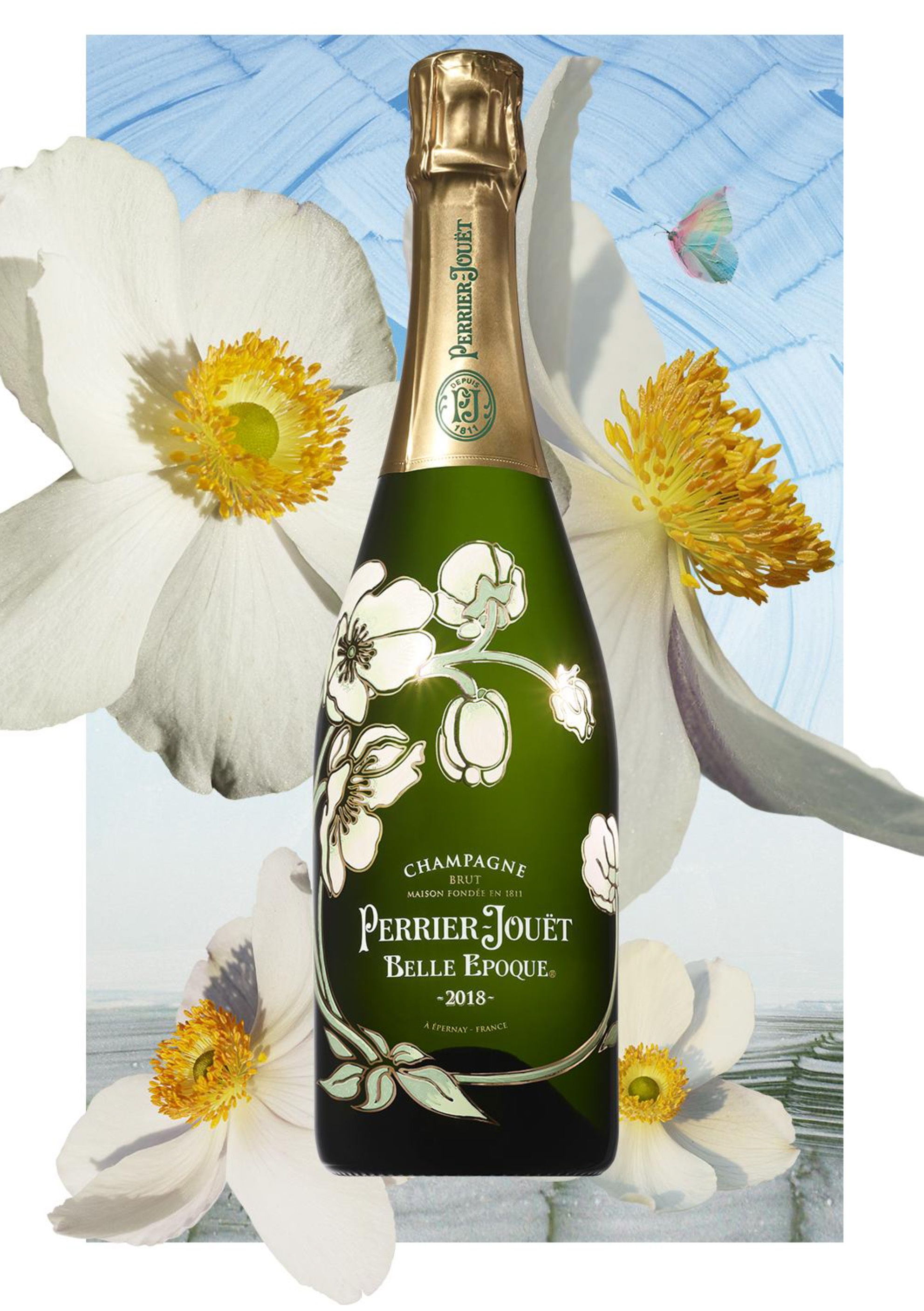 Flasche Perrier-Jouët Belle Epoque mit Blumen