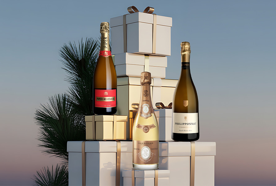 Three bottles of large format champagne, bordeaux wine and burgundy wine