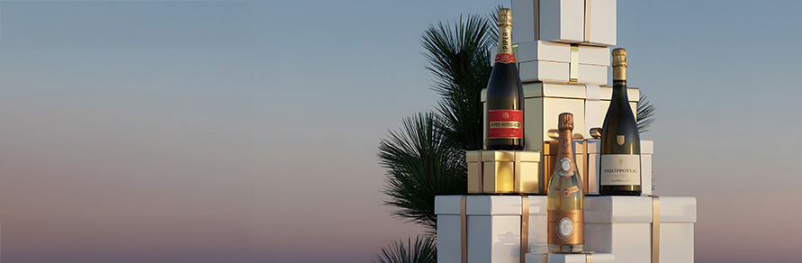 Three bottles of Champagne in a cosy living room